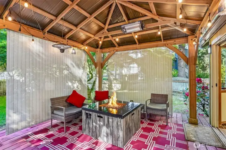 Rain or shine, this covered patio was made for cozy nights, morning coffee, and hosting friends year-round.