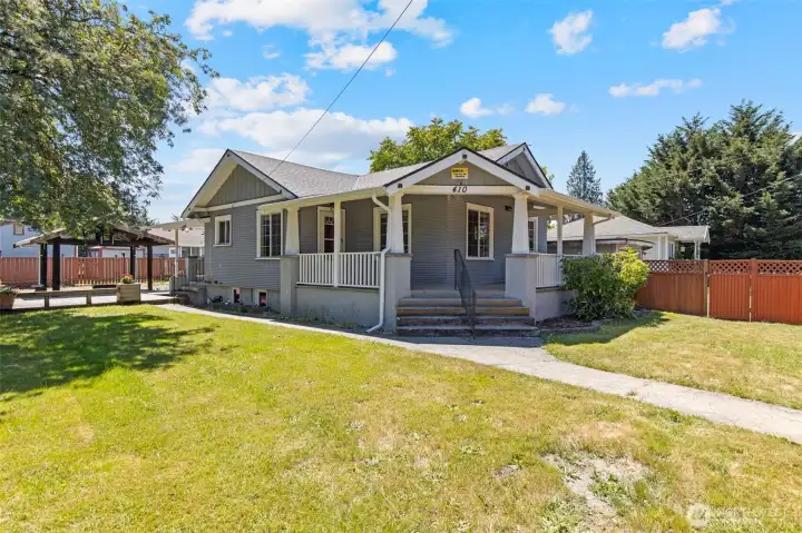 Charm, warmth, and space!  Huge front porch welcomes you home.