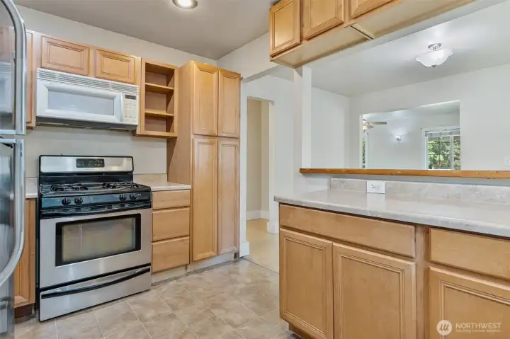 Gas range, microwave, and pantry