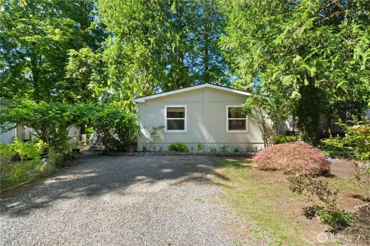 Welcome to this spacious, well-maintained home surrounded by mature trees, offering exceptional privacy and a serene park-like setting. Welcome to this spacious, well-maintained home surrounded by mature trees, offering exceptional privacy and a serene park-like setting.