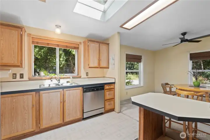 Bright kitchen offers plenty of counter space Bright kitchen offers plenty of counter space