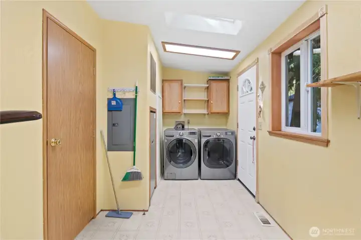 Utility room conveniently located off kitchen includes newer washer and dryer. Utility room conveniently located off kitchen includes newer washer and dryer.