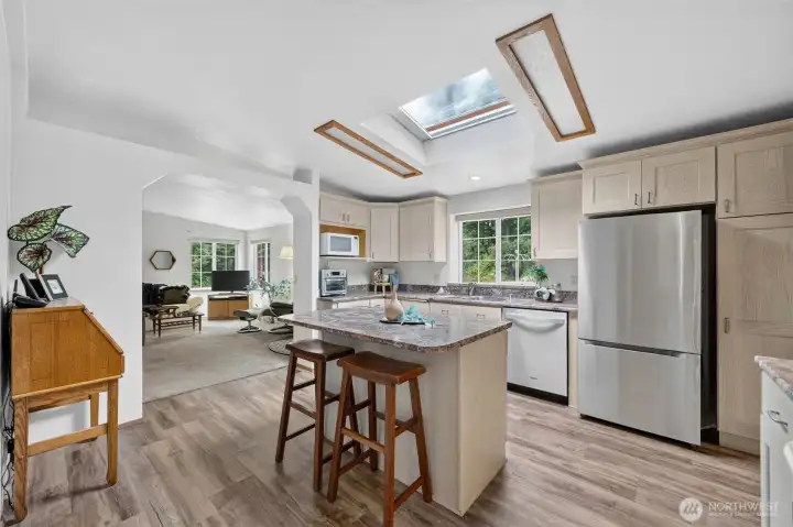 Spacious kitchen with new fridge and dishwasher. Spacious kitchen with new fridge and dishwasher.