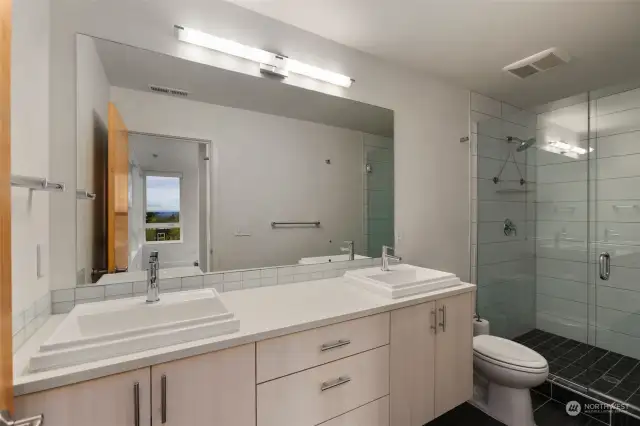 Dual vanity primary bath with Walk-In Shower.