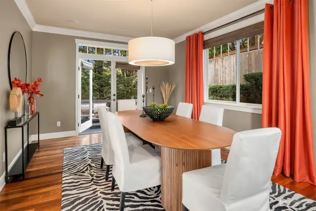 The formal dining room off the kitchen also  makes a great TV room if so desired.