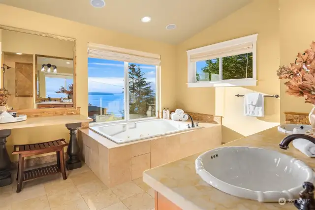 Soaking tub with a view in the 5-piece primary bath.