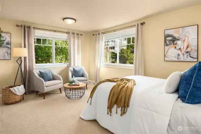 Two additional generously sized bedrooms  and a conveniently located laundry room  complete the upper floor, providing an ideal  layout for family living.