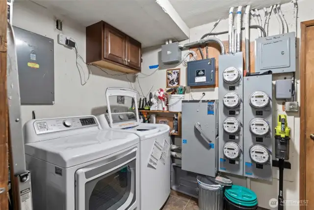 On the lower floor of the building is the laundry rooms currently used by only three units.