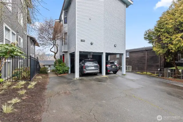 This unit has a reserved parking place that is the far right of this paved area.