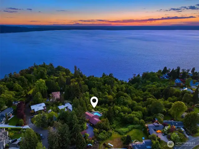 Welcome to Normandy Park's sweet living with this 1.3-acre nature oasis overlooking west facing sea & Olympics scapes.