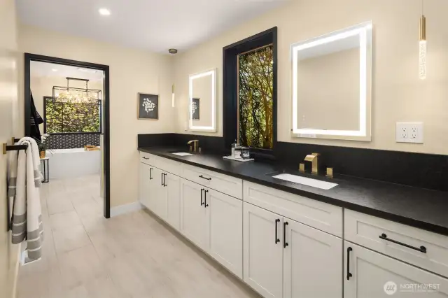 Spa bathroom divided into counter space and vanity...