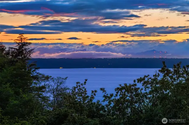 One can catch a glimpse of the striking Olympics silhouette behind the rain clouds. Enjoy iconic sunsets and watch storms brewing from the comfort of Home.
