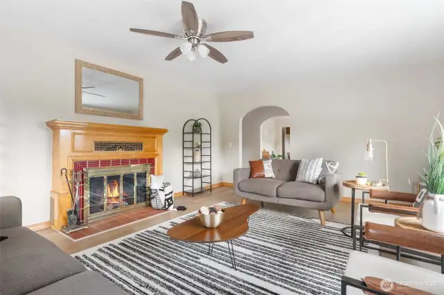 Stunning vintage wood-burning fireplace  surround has been well maintained.