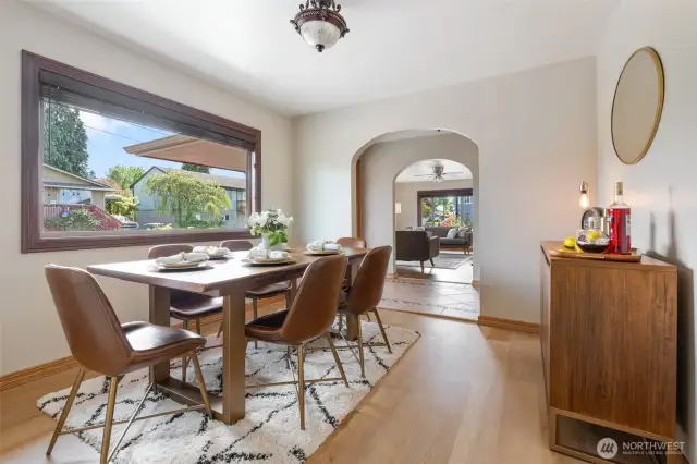 Large dining room with giant picture window.