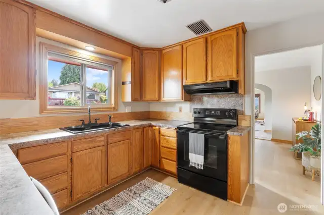 Nicely sized kitchen has lots of counter space.