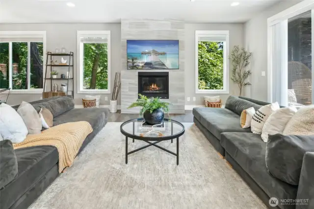 . The main floor welcomes you with a spacious home office, an expansive great room ideal for entertaining, both formal and casual dining areas that flow effortlessly for everyday living and a covered balcony for year-round outdoor living.