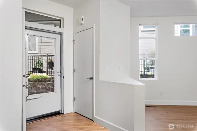 Front door accesed via side walkway