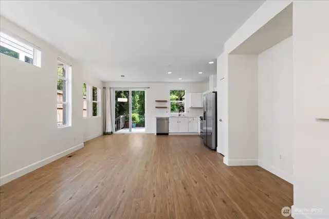Spacious living room flows into the kitchen and dining area