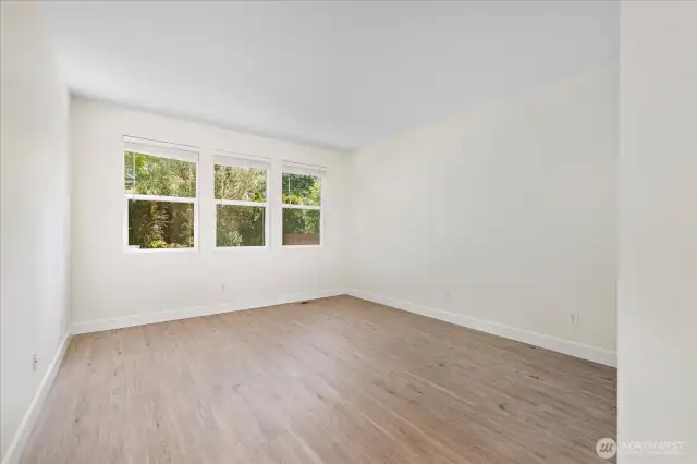 Large primary bedroom at the rear of the house