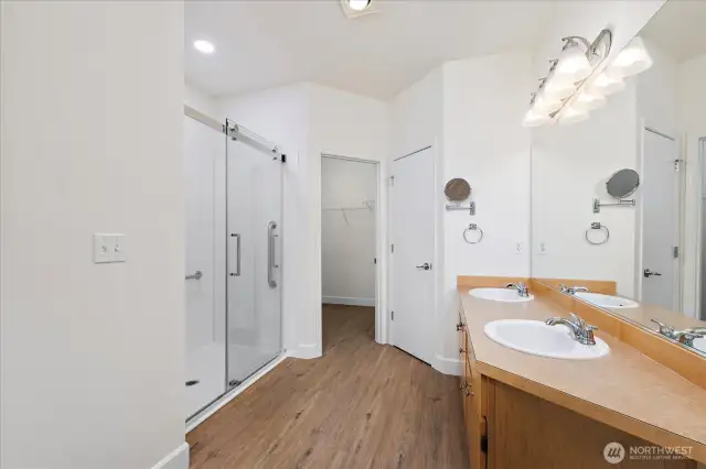 New accessible shower with walk-in closet beyond
