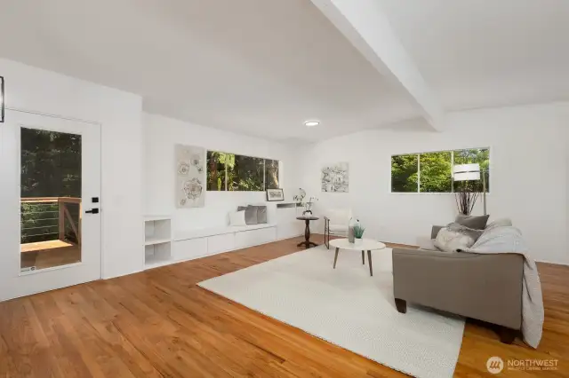 HUGE AND SPACOIUS FAMILY ROOM WITH BUILT INS AND FRENCH DOOR ACCESS TO BACK DECK