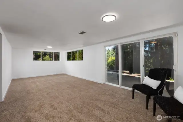 BONUS ROOM WITH SLIDING DOOR ACCESSING BACK YARD AREA
