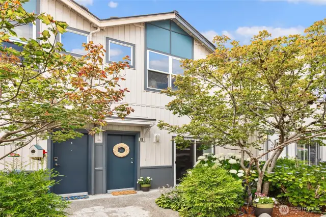 Welcoming entry to this charming townhome