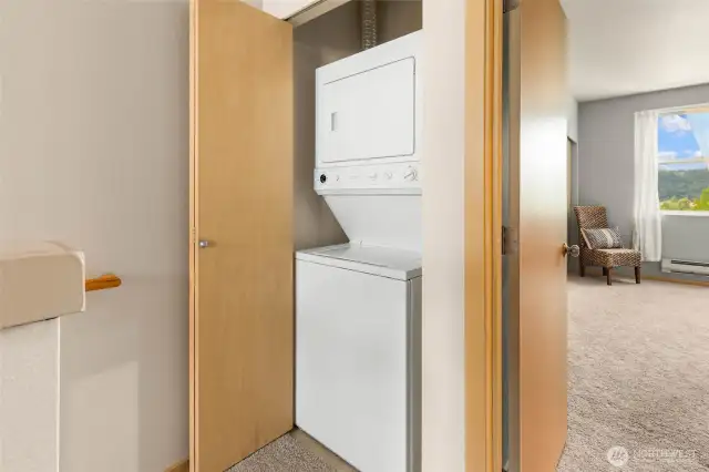 Laundry conveniently located at top of stairs