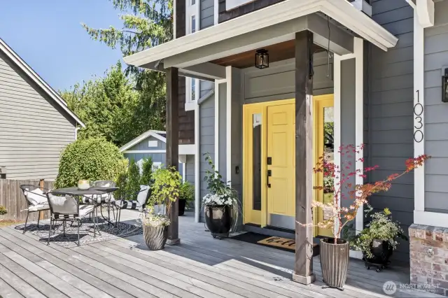The sun soaked front deck creates an inviting spot to enjoy with neighbors and to welcome guests.