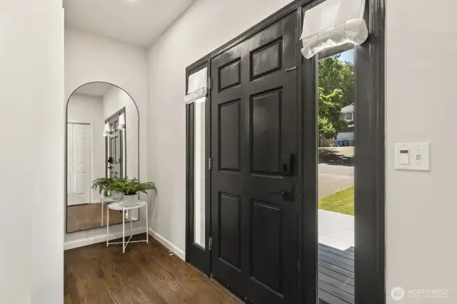 The foyer provides you plenty of space to greet guests while giving you a view onto your front deck.