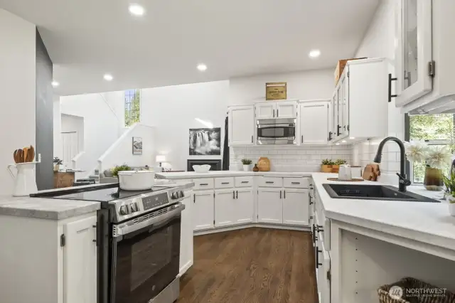 All new stainless steel appliances are included in this bright kitchen.