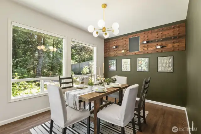 Show off your wine collection while enjoying a meal in this elegant, restaurant inspired dramatic dining room with garden views.