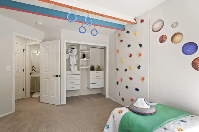 The third bedroom, adjacent to the bathroom and linen closet, also includes a useful closet system for holding all the apparel and gear for whatever journey you take.