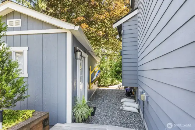 Huge Bonus! Located on the side of the house, with matching exterior and fully functioning heating and air conditioning, is this flex space that can be used for workout room, office, play space or storage.  (Not included in the home's square footage).
