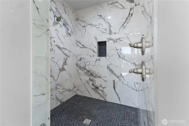 Primary Suite Double headed shower with bench