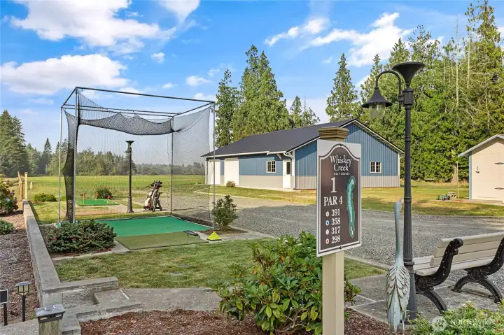 Golf anyone? Well maintained property featuring your very own golf practice net & putting green