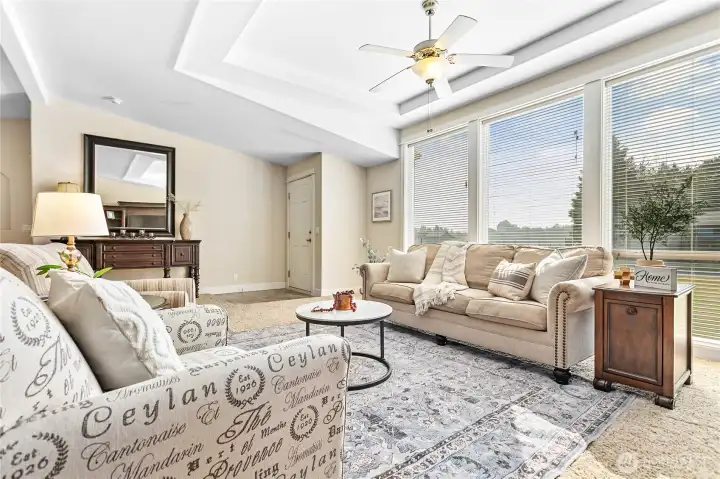 Love the floor to ceiling windows in living room