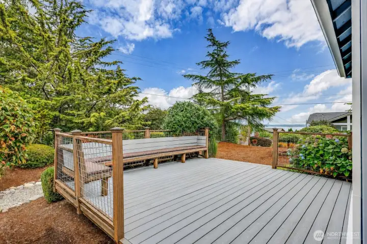 Morning coffee comes with a side of the Cascade Mountains. This deck keeps it simple while offering some of the best skyline views in the area.