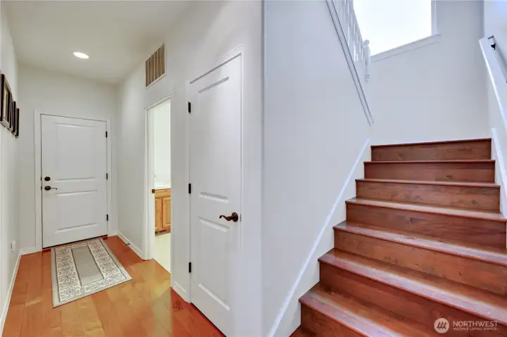 he transition point. Clean lines and solid hardwood at the entrance provide a simple, warm welcome home.