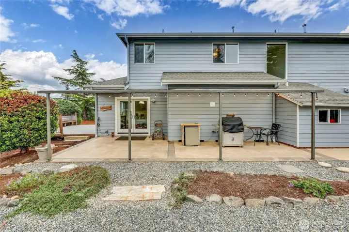 When you need a break from the sun or the rain, this covered patio offers a grounded, private escape.