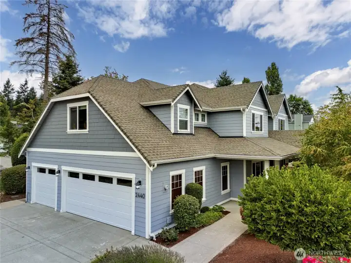 3,308 sq ft of contemporary design on a corner lot. It’s a substantial home that stays understated from the street.