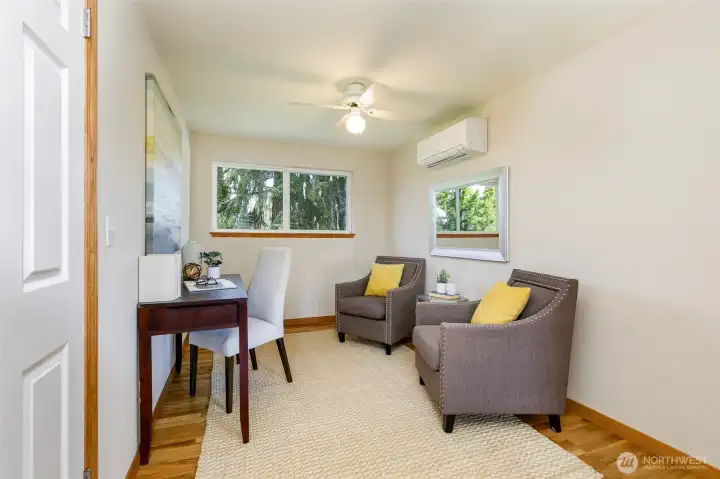 Close up view of sitting area in primary suite--also 3rd closet area. AC comfort for hot summer nights