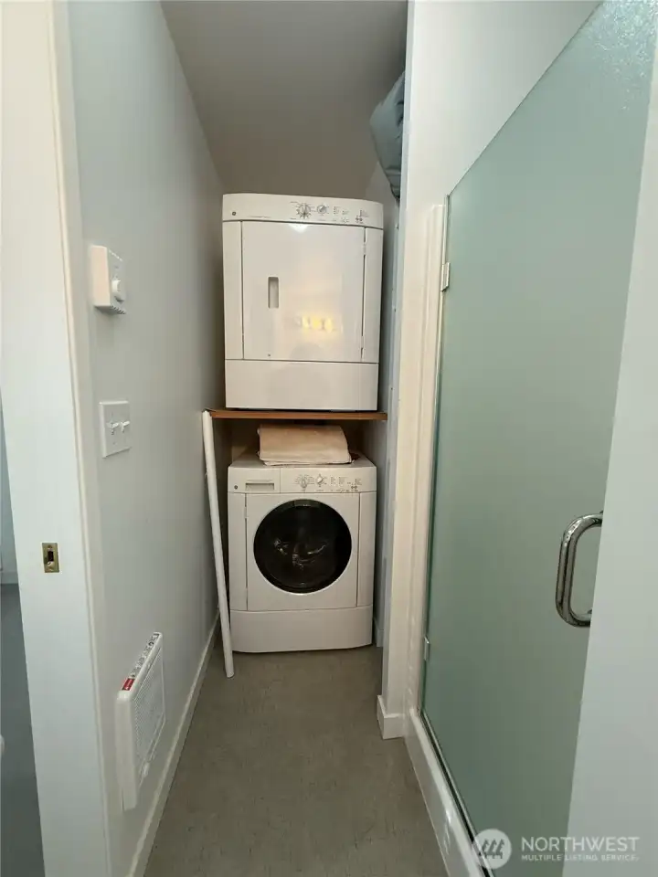 Laundry nook in the bathroom of the guest bedroom.