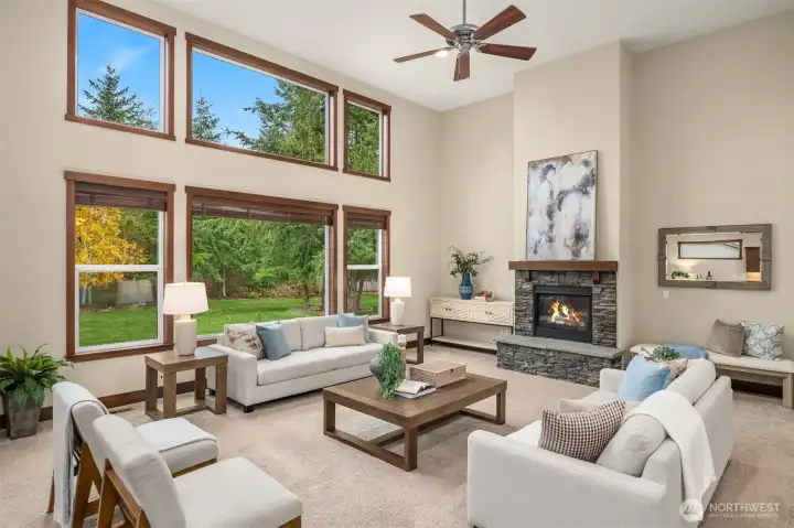 Soaring 15' tall ceilings in the entryway and greatroom