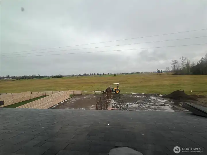 View of the backyard from 2nd of 3 bedrooms