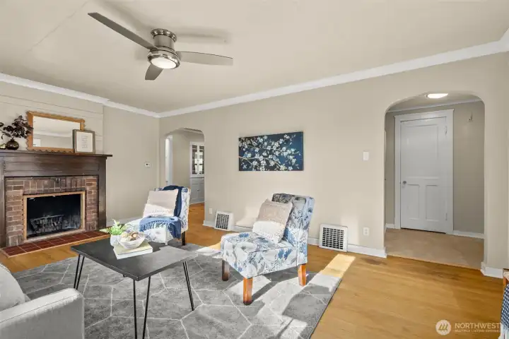 The original hardwoods positively glow and bring so much warmth to the space, while the modern ceiling fan adds a fresh, stylish touch and keeps things comfortable year-round.
