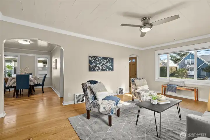 The hardwoods flow seamlessly into the formal dining room, giving the space a warm, cohesive feel that’s perfect for everyday meals, lingering conversations, or hosting with ease.