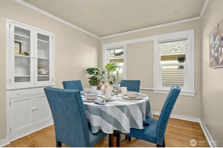 What a beautiful space! Classic built-ins and double windows give this room so much charm and flexibility, just as lovely for a dining table as it would be for a bright, inspiring home office or creative workspace.