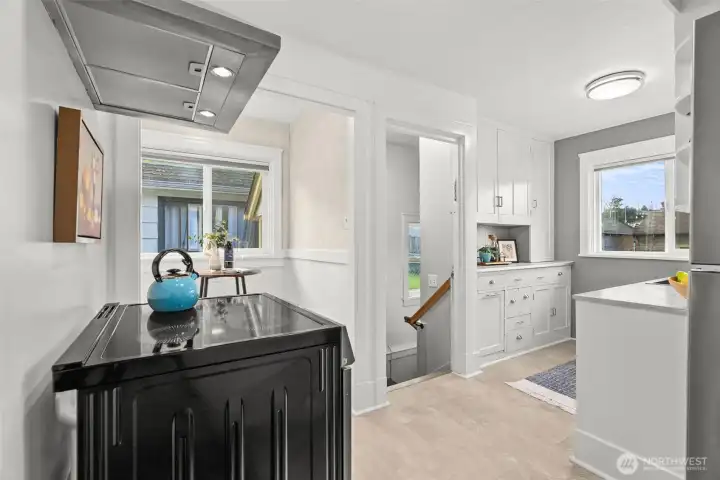 Yet again, the perfect blend of old and new steals the show. Full-height cupboards add timeless charm, all appliances just one year new bring modern ease, and that sweet dining nook feels like the kind of spot you’ll linger in longer than planned.