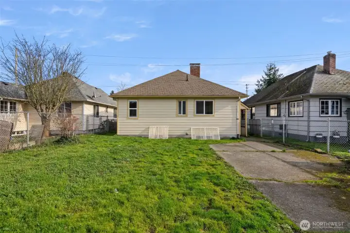 Those frames leaning against the house are just doing a little behind-the-scenes work, gently guiding water away from the window wells. Natural light still makes its way into the basement, and the space stays dry, bright, and comfortable.
